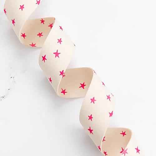 Starry webbing pink on natural 1.5” - sold by the yard