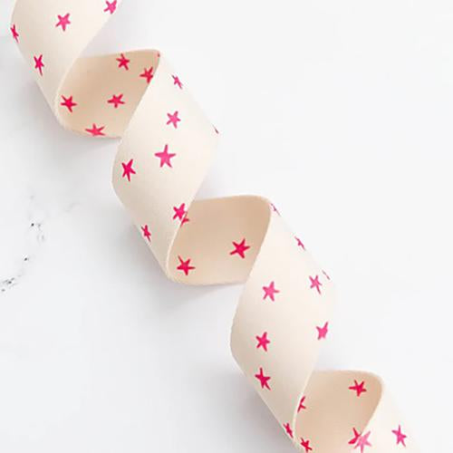 Starry webbing pink on natural 1.5” - sold by the yard